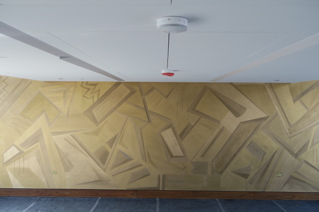 Bold geometric gold designed feature wall